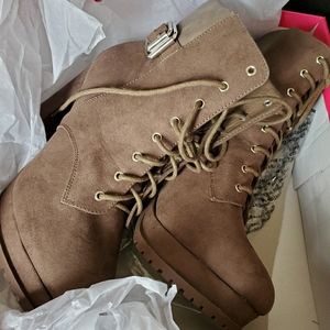 Booties New with tags lace up